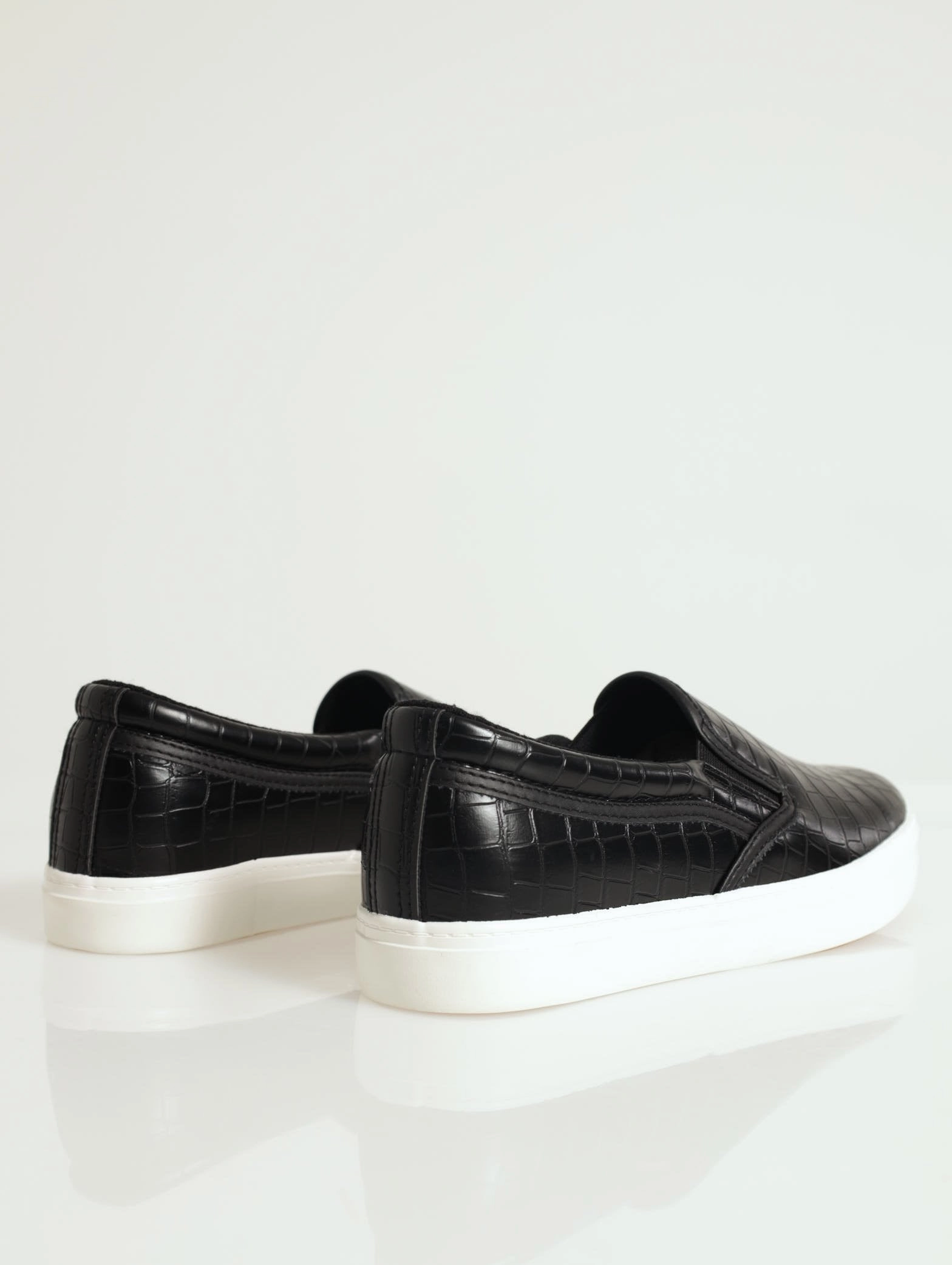 Slip On Street Sneaker With Metal Heel Insert