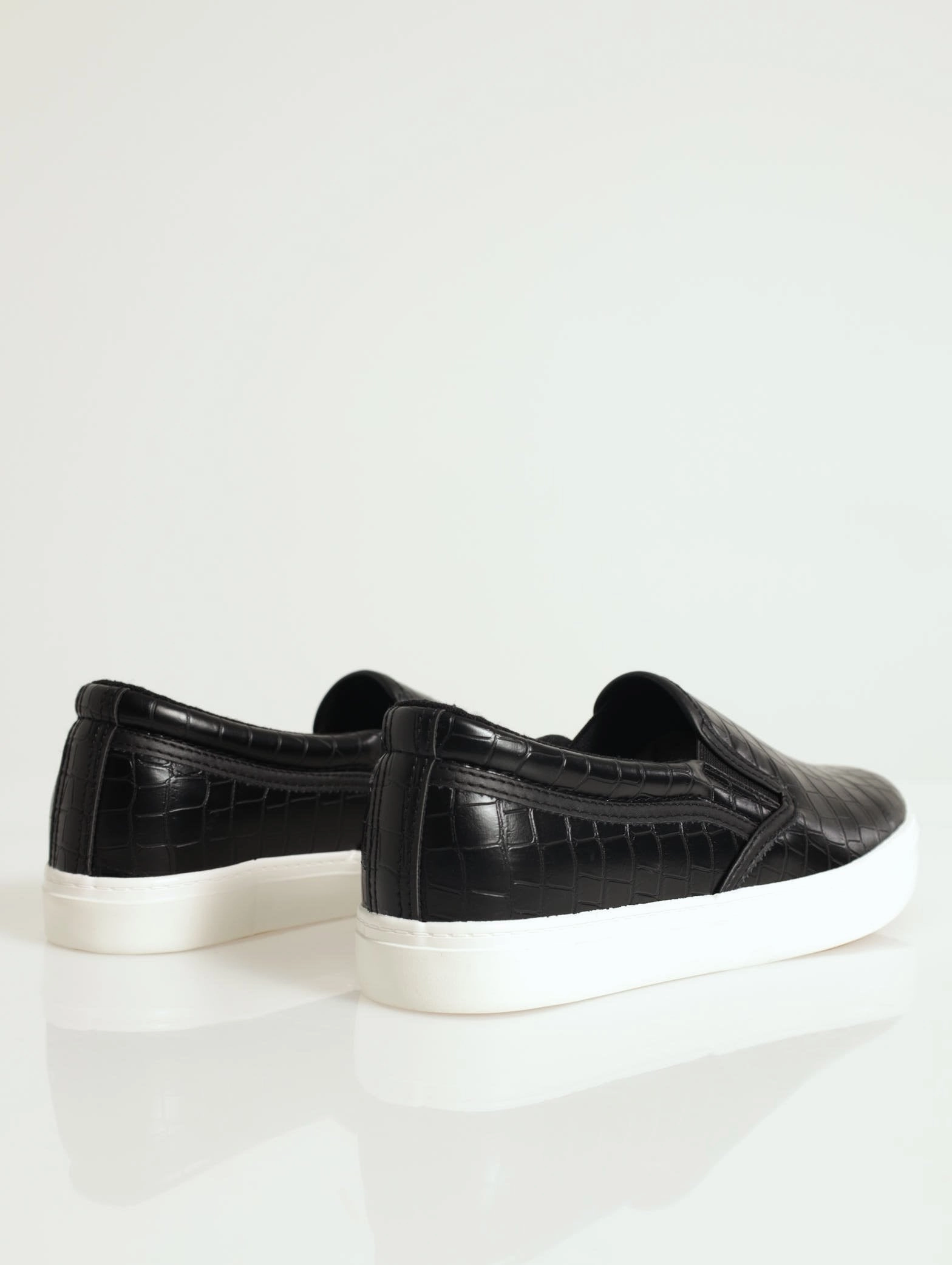 Slip On Street Sneaker With Metal Heel Insert